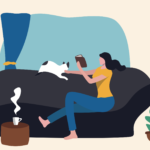 Woman reading a book on the couch