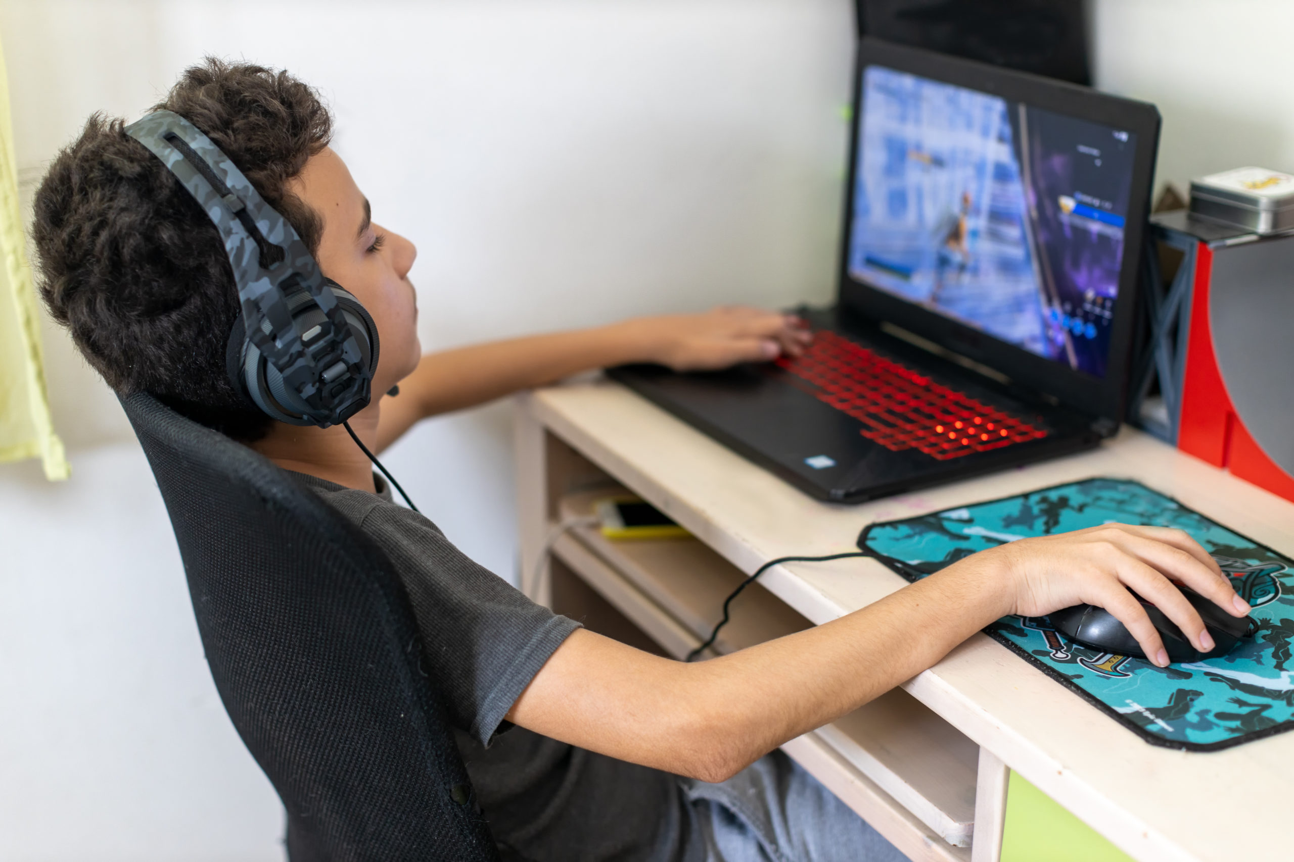 Middle school-aged child plays educational online learning game